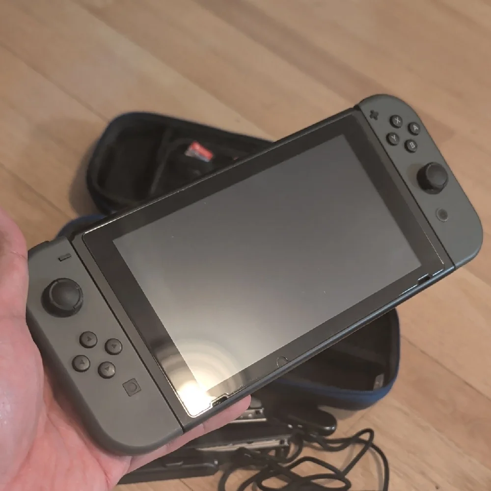 Nintendo Switch with Added Joy cons, Games, Case And Accessories